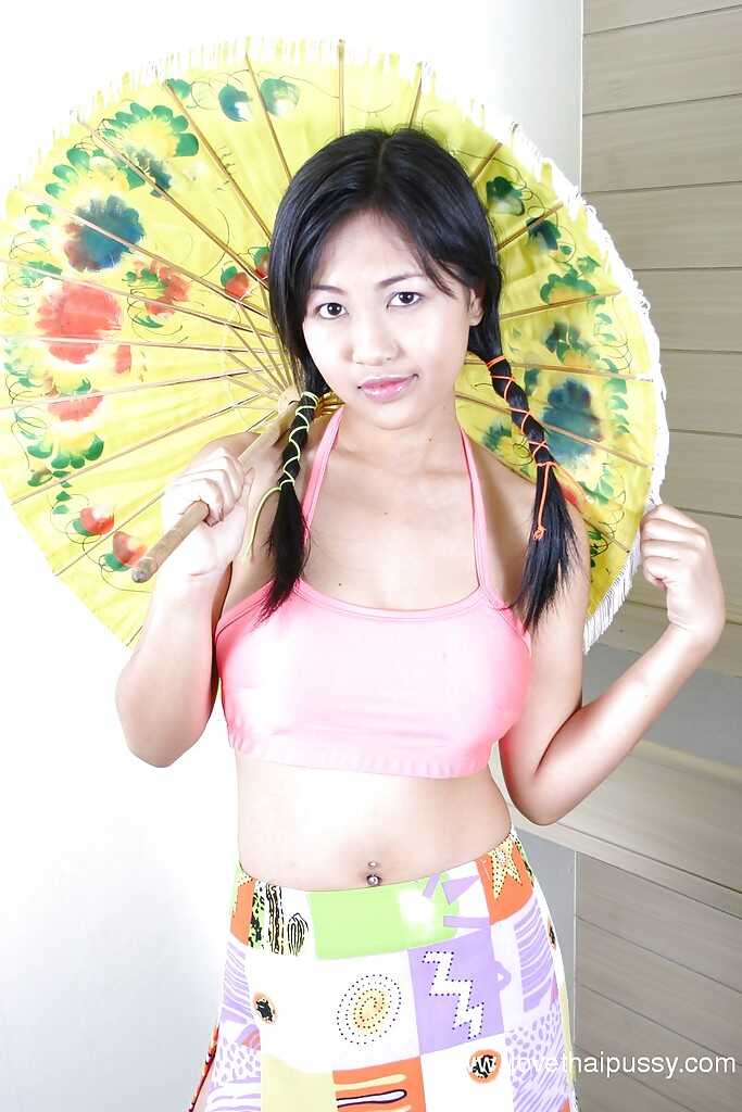 Pat's Busty Asian Babe with Pigtails Stripping and Playing with a Dildo Adventure - Pat
