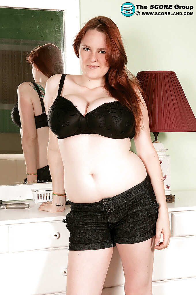 Seductive Redhead Catt Green Strips Down For Her Sexy Body In Front Of The Camera - Catt Green