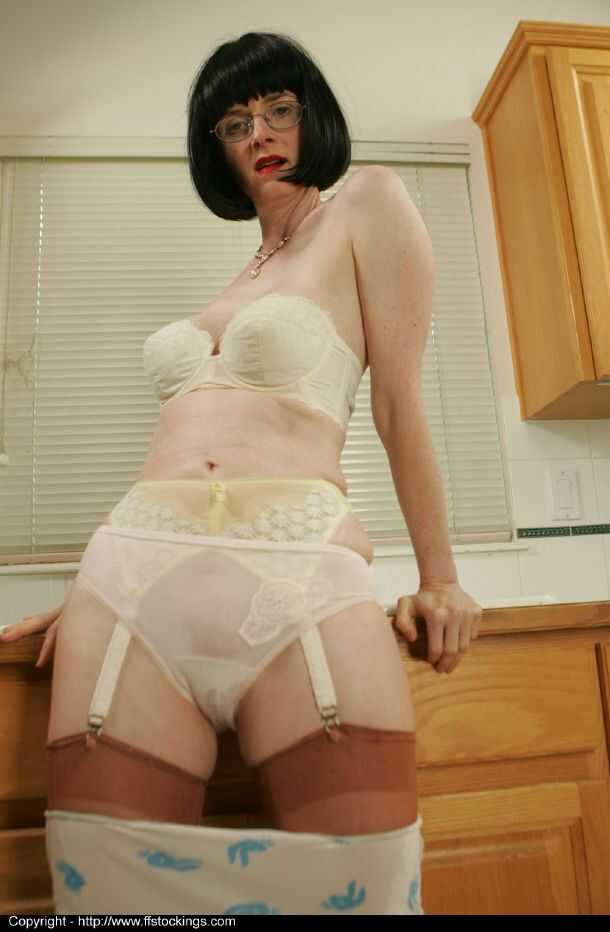 Brunette MILF in Lacy Lingerie and Heels Posing for the Camera - 