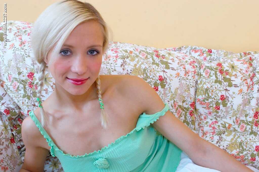 Amateur European babe with pigtails and pretty face fucks her pussy with a huge dildo while playing with her big tits - Feona