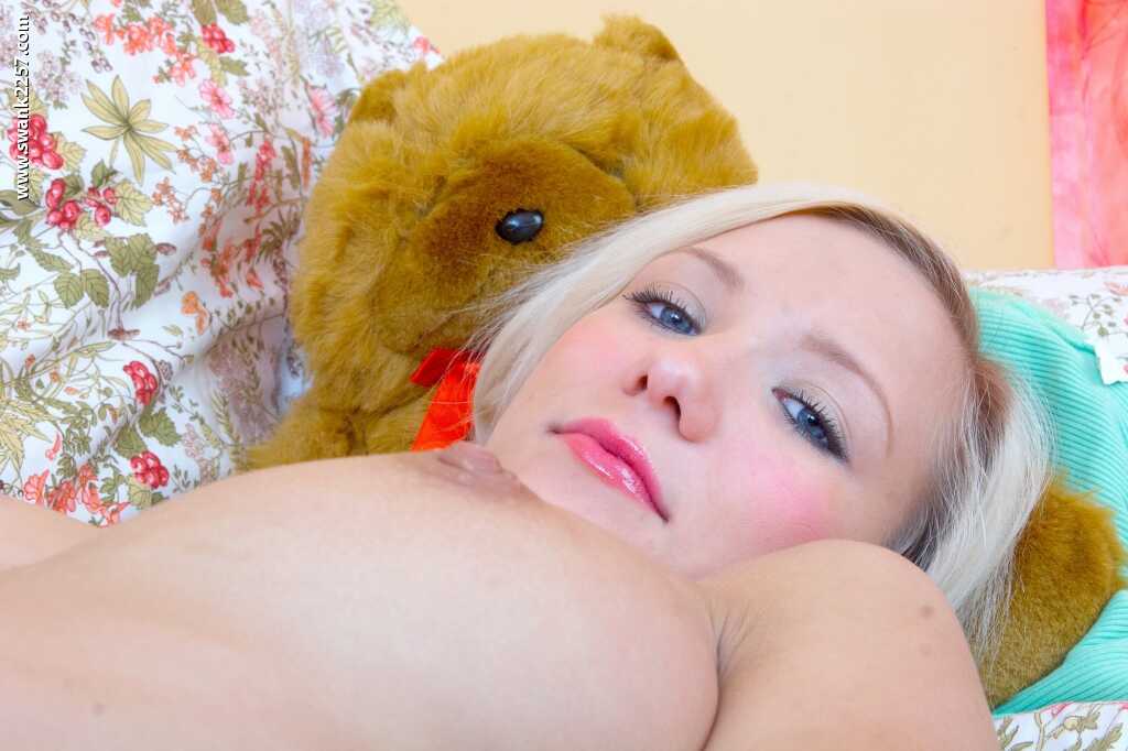 Amateur European babe with pigtails and pretty face fucks her pussy with a huge dildo while playing with her big tits - Feona