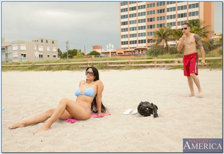Mature Latina Mason Storm riding the young stranger's cock on the beach, with her big tits and round ass bouncing in ...