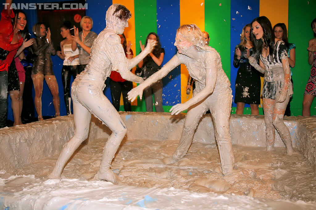 Fully Clothed Stiletto Divas Mud Wrestling in Thigh-High Boots