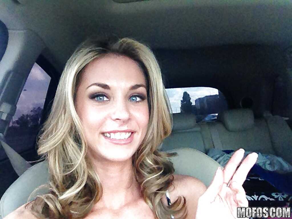 Busty blonde amatuer Michelle Monroe fucking herself with a dildo while driving solo in her sports car - Michelle Monroe