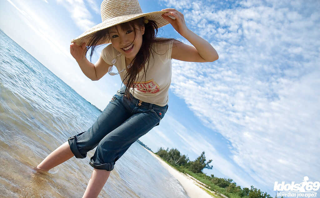 Sweet asian babe Mari Misaki uncovering her tempting curves outdoor in the hot summer sun.