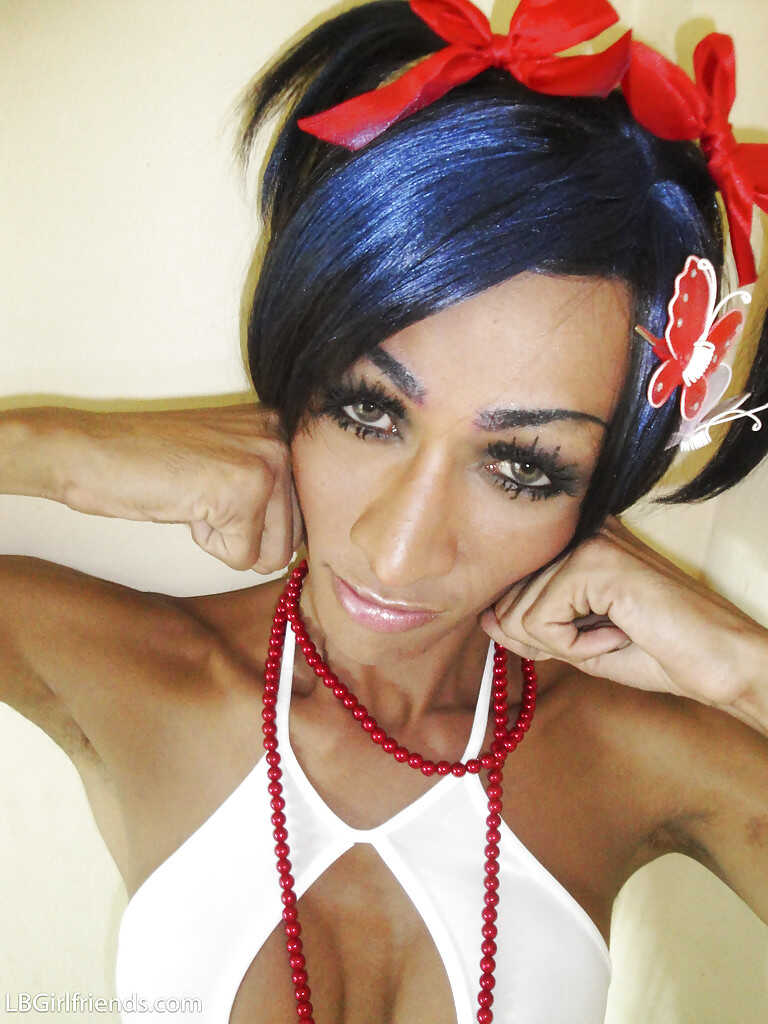 Asian shemale goddess Tina squeezes out a massive dick from her tight latex crotch while wearing sky-high stilettos - 