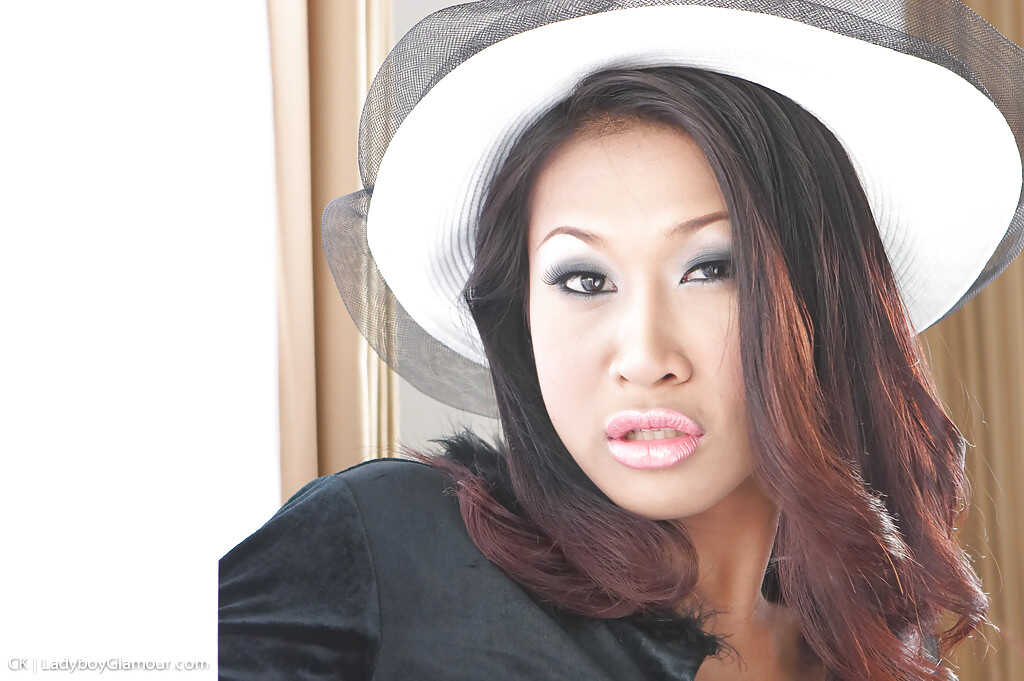 Oriental Transgender Temptress Teases with Tangled Titties in Thigh Highs - 