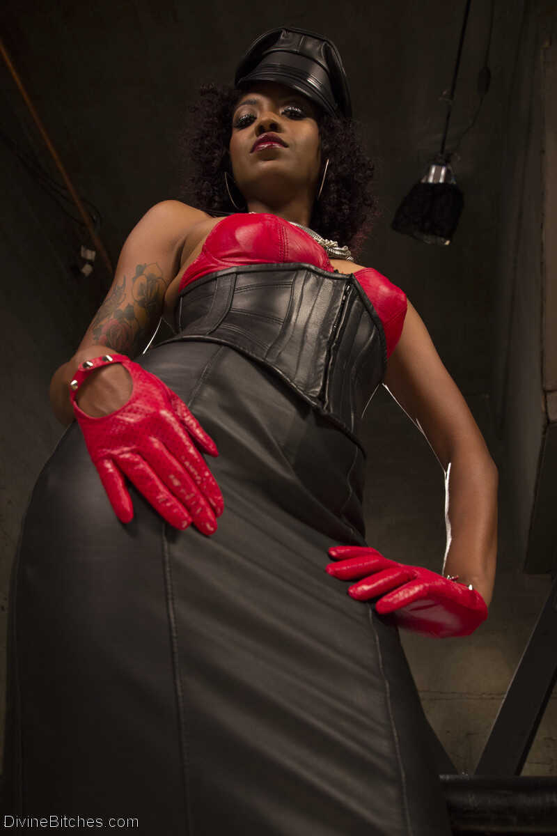 Leather-clad ebony femdom mistress Lotus Lain revealing her tiny tits and nipples - Alexander Gustavo, Lotus Lain