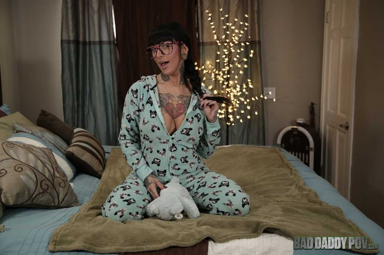 Tatted Jessie Lee Exposes Her Juicy Natural Breasts on a Bed of Roses - Jessie Lee