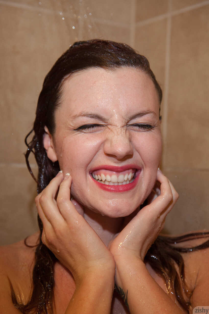 Felicia Davies gets soaking wet in the shower and explores her big natural breasts - Felicia Davies