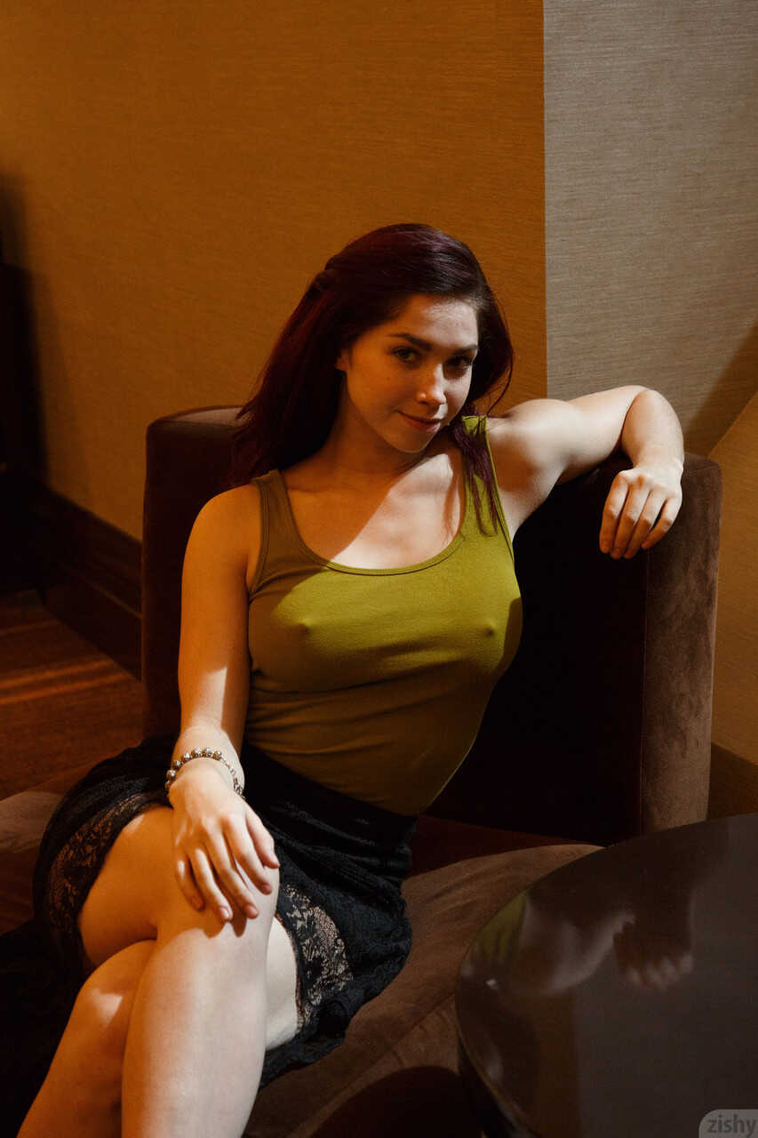 Redheaded babe Jazz Reilly gets naughty with her flexible body and teases you with an upskirt show - Jazz Reilly