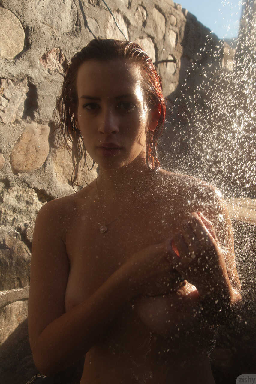 Orli Krowan's Busty Nude Show: Amateur Redhead Loses Her Sheer Purple Dress Outdoors and Takes a Shower