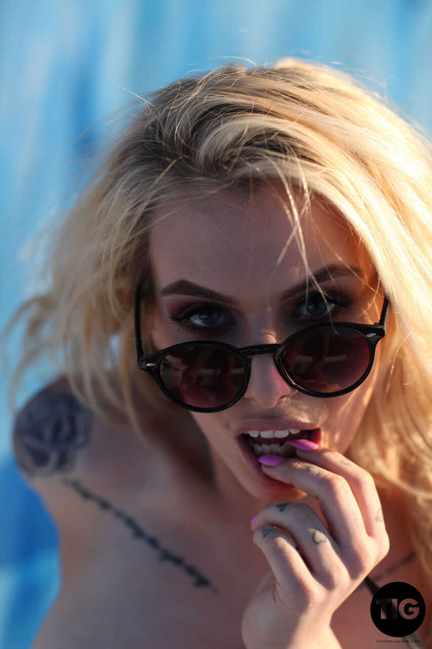 Blonde Saskia's Sheer Drop: A Tattooed Milf Poses Topless in Lingerie and High Heels - Saskia Valentine