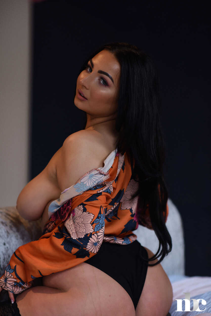 Brunette Foxy Lucina bounces on her big booty while revealing her huge natural tits - Foxy Lucina