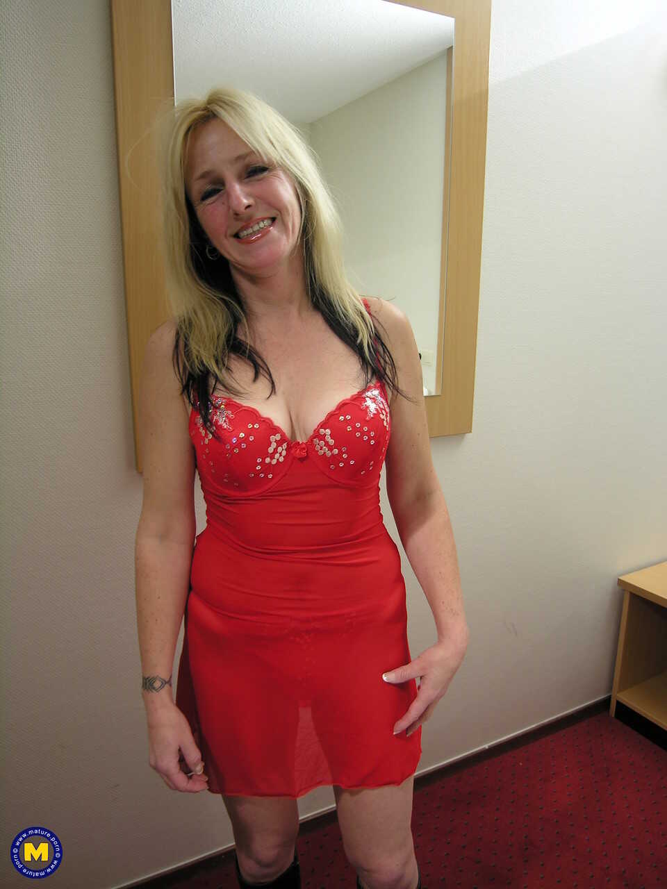 Jasmijn's Red Dress Disaster: Mature Blonde Gets Pounded Hard in Boots while Taking on All Comers - Jasmijn