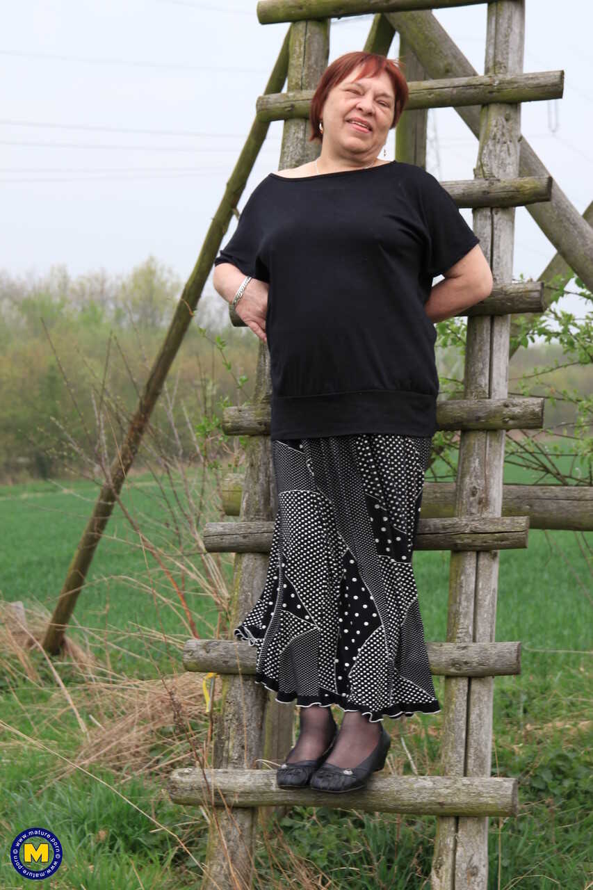 Redhead granny Sheila's swollen vagina on the outdoor ladder BBW Granny Pussy - Sheila
