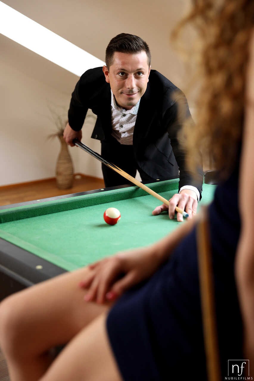 Sexy teenage virgin Sabrina Spice gets seduced and fucked on the pool table by Nick Ross in a tight dress while kissing an...