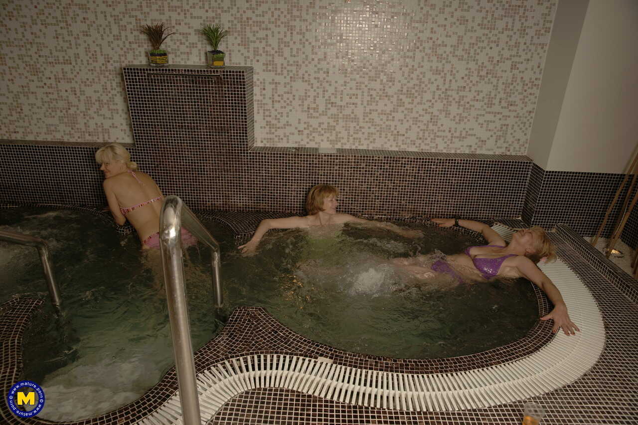 Mature amateurs shower naked at the spa and enjoy the sauna in their bikinis while indulging in lesbian pleasures with eac...
