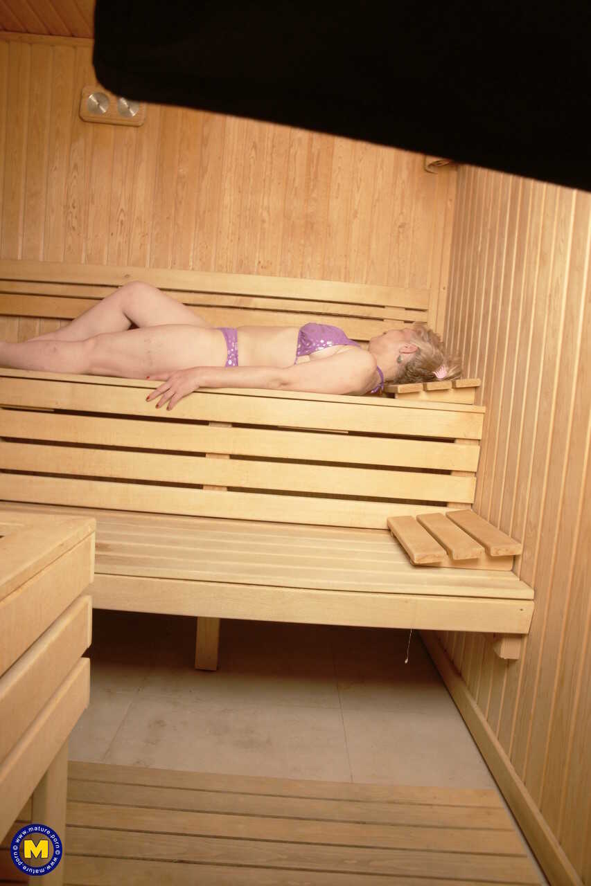 Mature amateurs shower naked at the spa and enjoy the sauna in their bikinis while indulging in lesbian pleasures with eac...