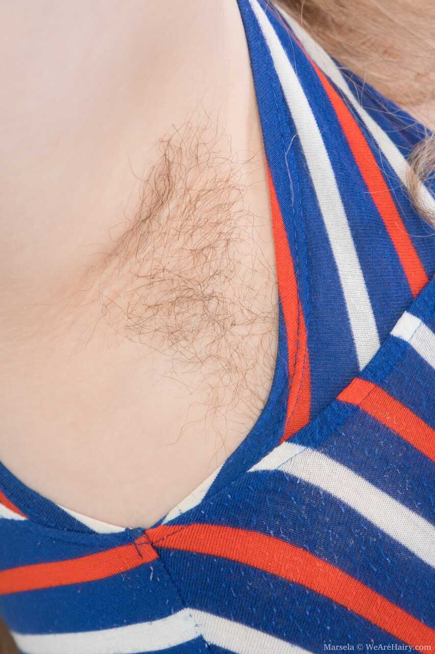 Big breasted fatty Marsela fucking her furry pussy with a purple toy and using it to please her mature, hairy armpit pussy...