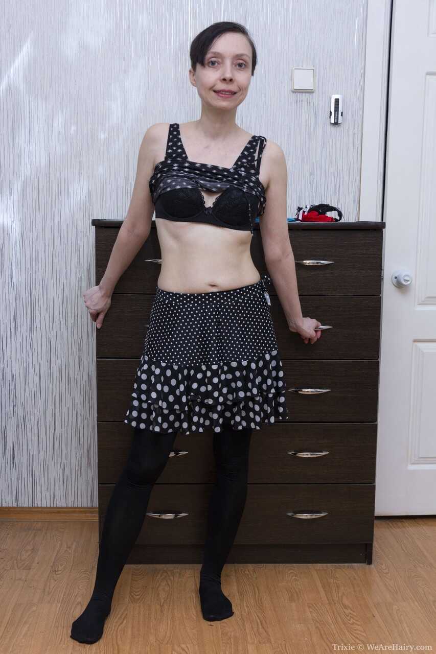 Brunette Trixie peels off her black dress & lingerie to show her hairy pussy and natural mature beauty! - Trixie