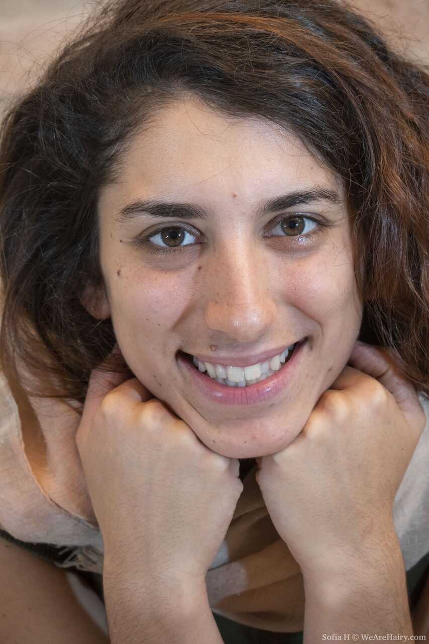 Sofia H's Furry Vagina on Display: A Cute Hippie Amateur with Hard Nipples and an Erect Pussy on a Wooden Desk - Sofia H