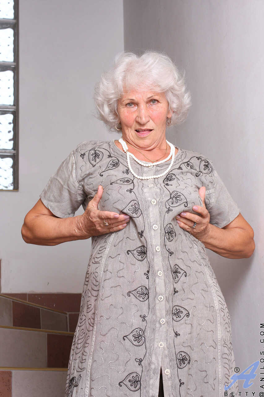 Granny Betty's Masturbation Striptease on the Stairs: A Hairy and Fat Older Woman's Lustful Pleasure Ride - Betty