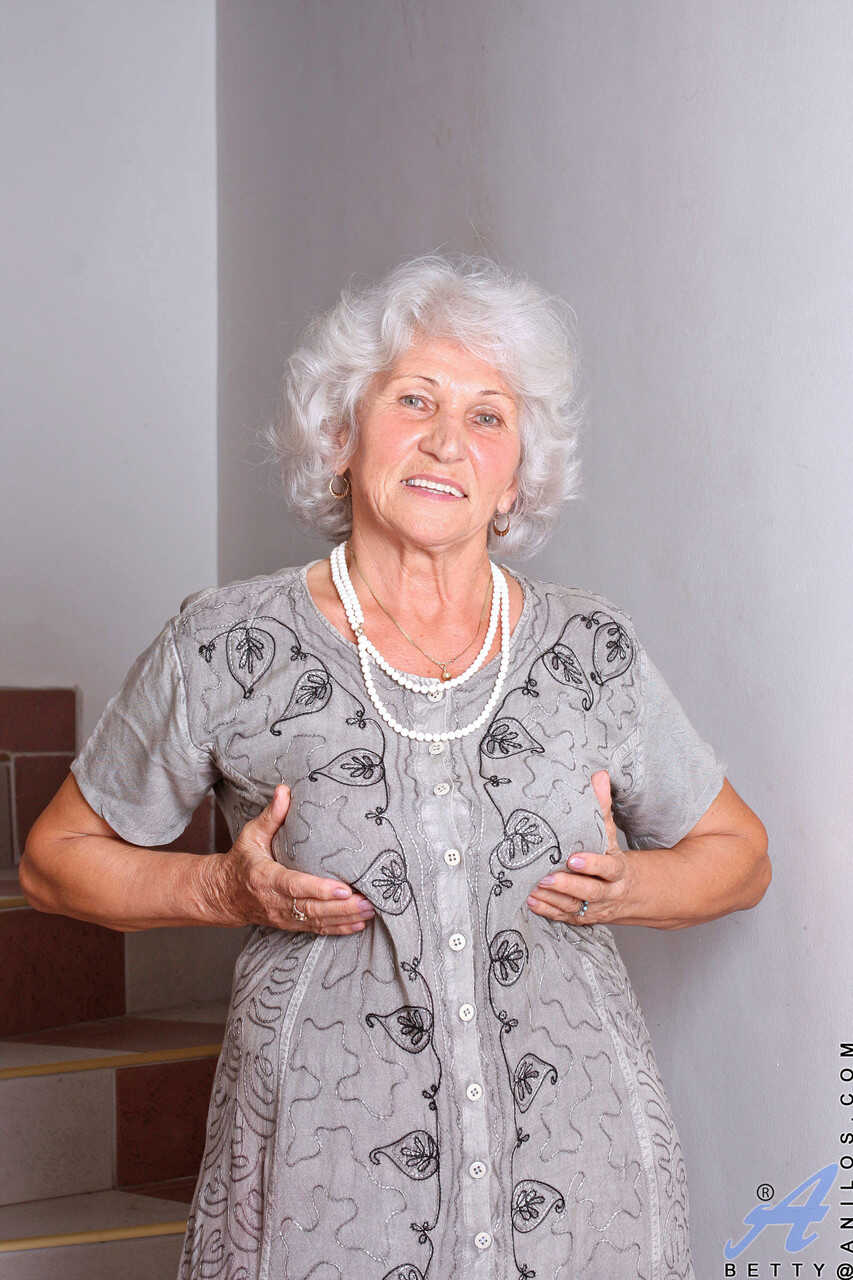 Granny Betty's Masturbation Striptease on the Stairs: A Hairy and Fat Older Woman's Lustful Pleasure Ride - Betty