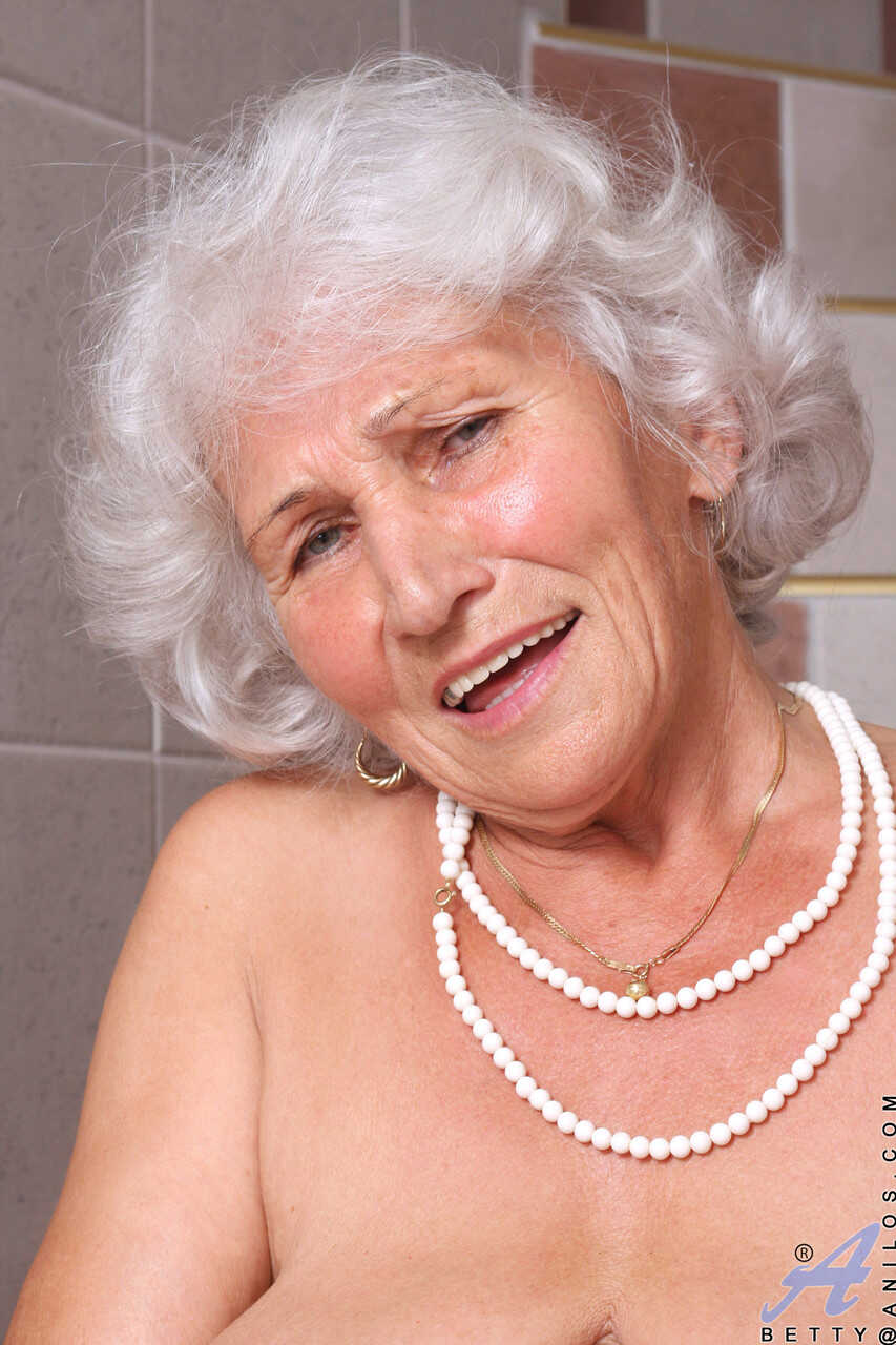 Granny Betty's Masturbation Striptease on the Stairs: A Hairy and Fat Older Woman's Lustful Pleasure Ride - Betty