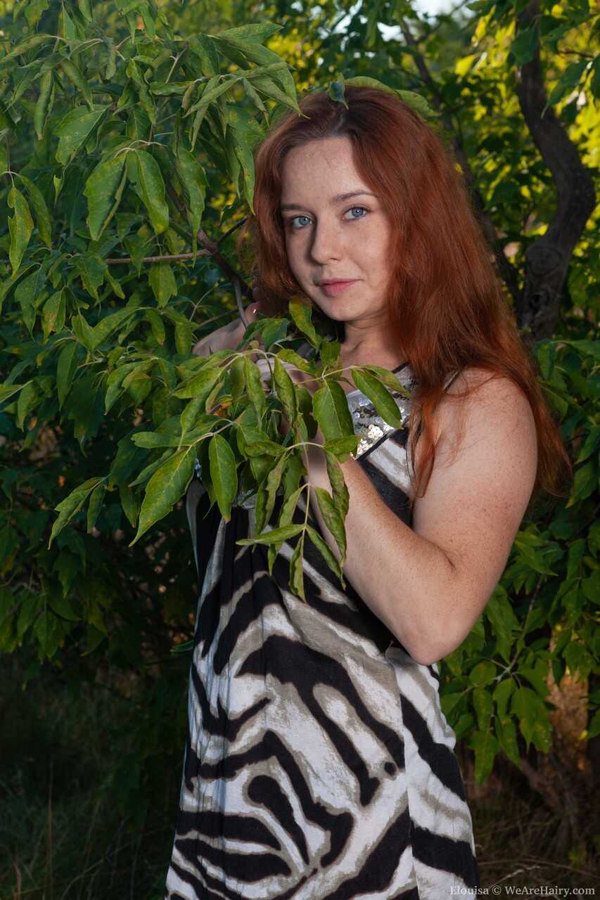 Amateur redhead Elouisa's outdoor nature adventure with her hairy pussy and big tits