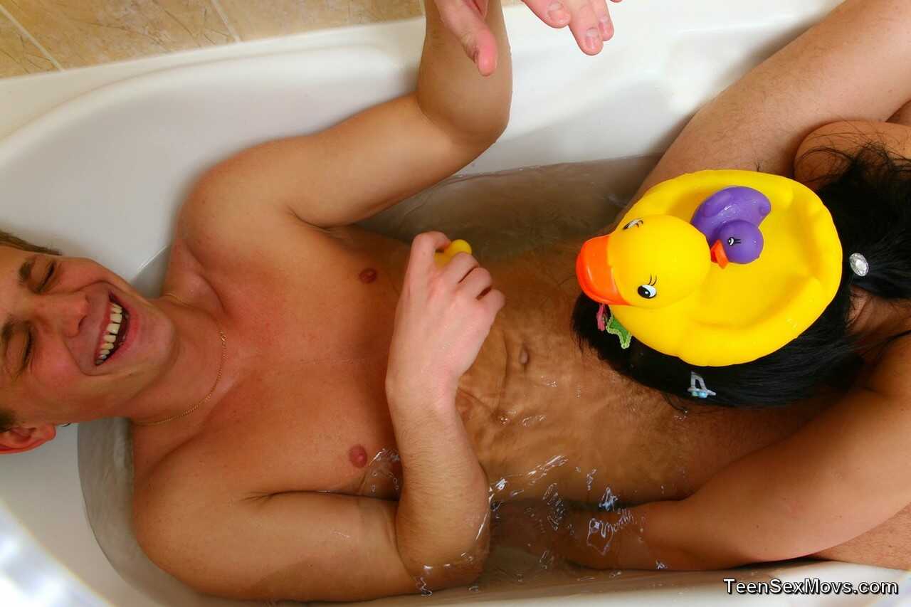 Busty brunette Gela B. gets soaking wet with her dog-style bubble bath sex - Gela B