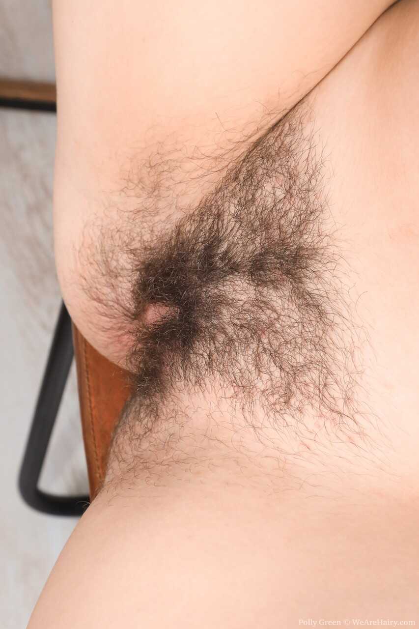 Russian teen Polly Green fingers her hairy twat while stripping to her socks. - Polly Green