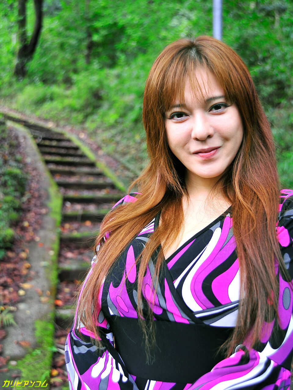Svelte Japanese redhead Yuki Tsukamoto shows off her tight body in lustful poses before taking it doggystyle from a big di...