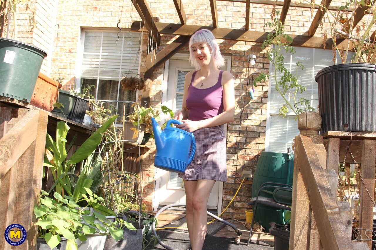 The Naughty Neighborhood Garden: Skinny Blonde Sylvie J Flashes Her Pussy In Public! - Sylvie J