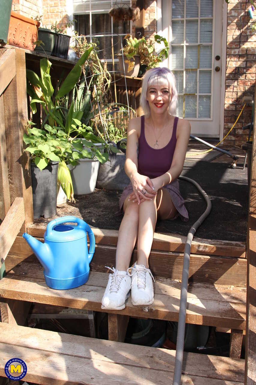 The Naughty Neighborhood Garden: Skinny Blonde Sylvie J Flashes Her Pussy In Public! - Sylvie J
