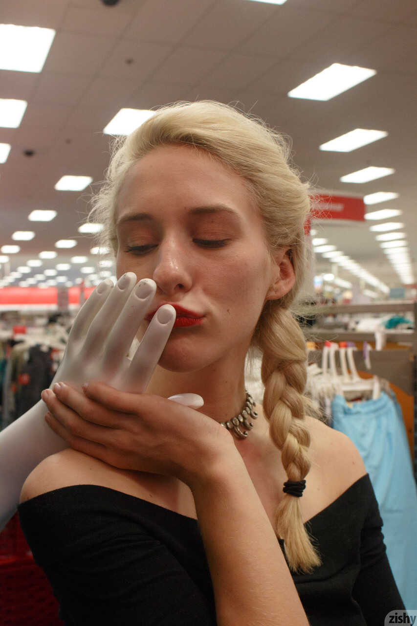 Blonde teen Leisel Bonnke gets caught flashing no panty upskirt inside a department store