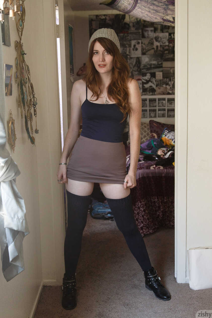 Watch as sexy redhead teen Zoe Fletcher flaunts her petite tits and toned ass in a skimpy thong panties! - Zoe Fletcher