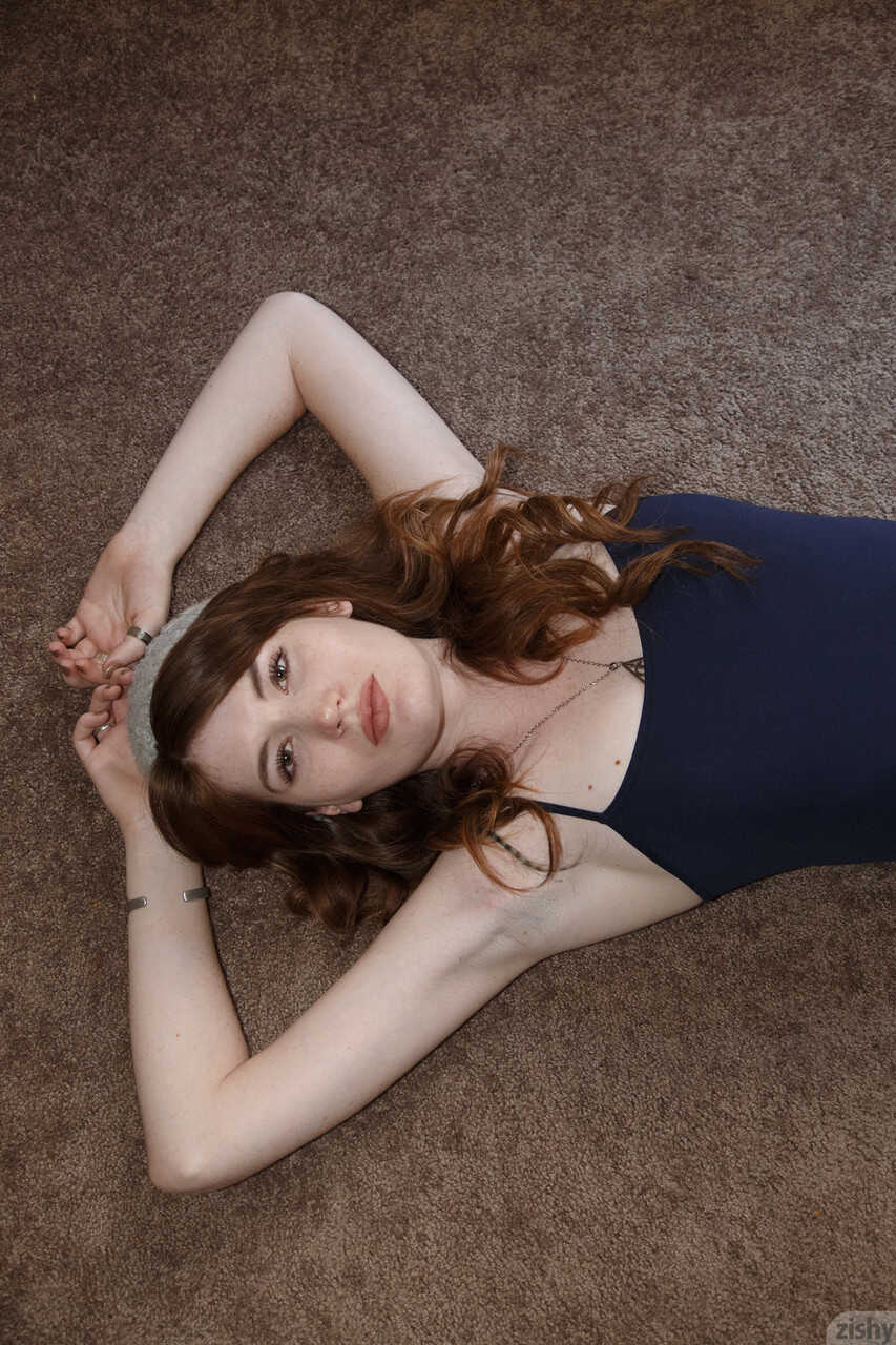 Watch as sexy redhead teen Zoe Fletcher flaunts her petite tits and toned ass in a skimpy thong panties! - Zoe Fletcher