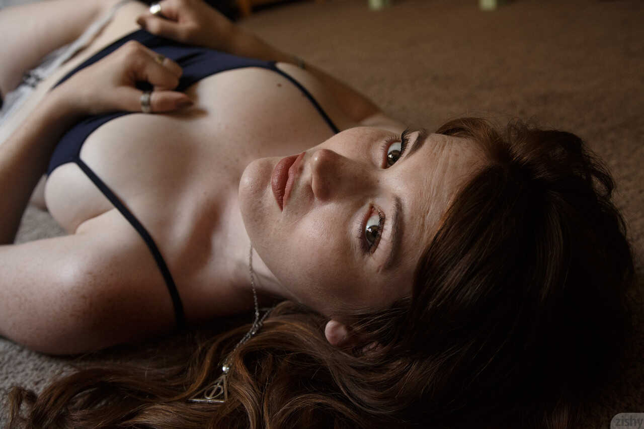 Watch as sexy redhead teen Zoe Fletcher flaunts her petite tits and toned ass in a skimpy thong panties! - Zoe Fletcher