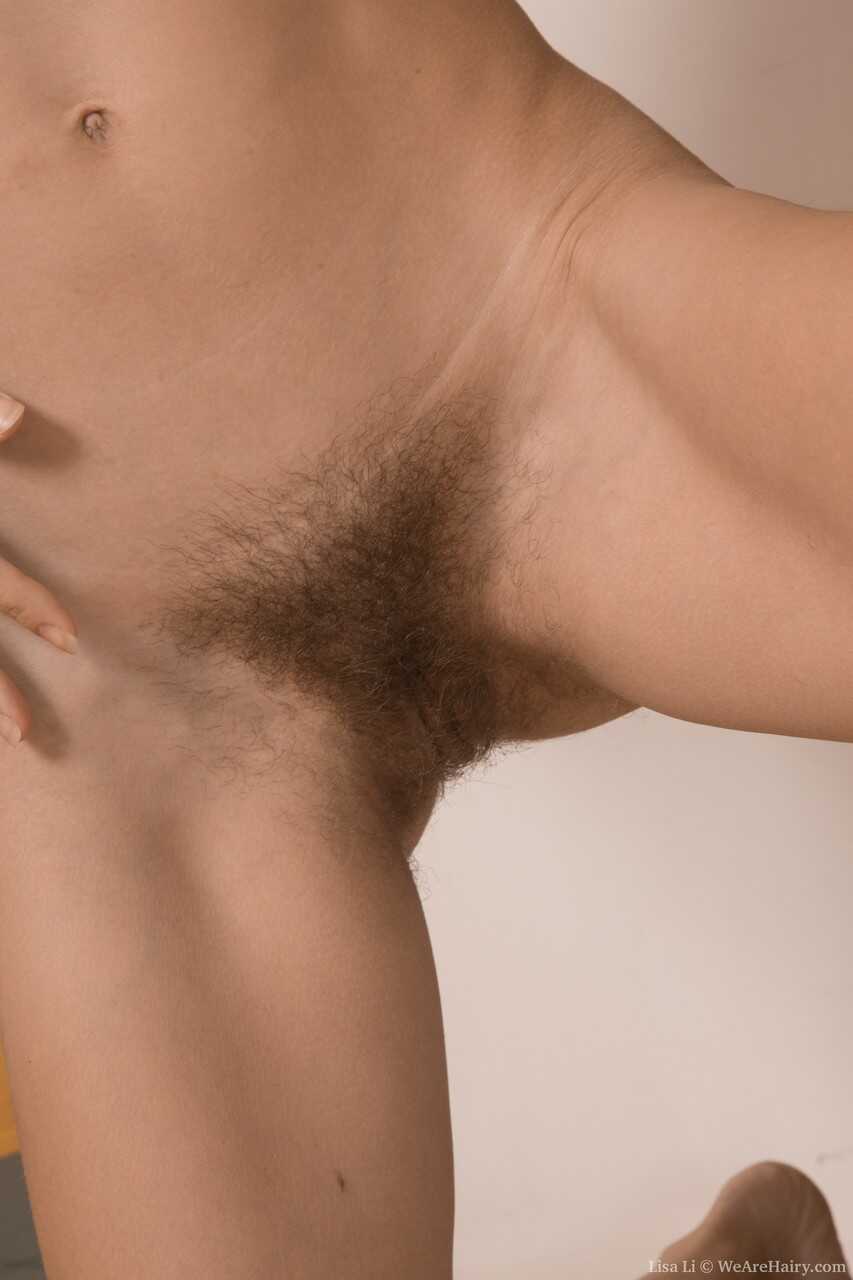 Hairy Russian Babe Lisa Li Shaves Her Furry Pussy On The Floor- Hairy White Pussy: Lisa Li's Furry Hole Exposed In Th...