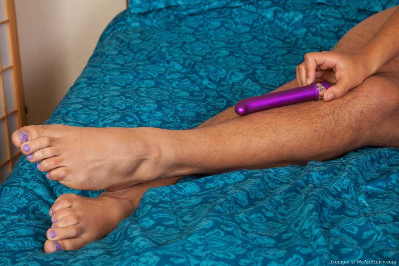 Exotic brunette with hairy body Yonique plays with purple toy on her bed gets down and dirty with her giant hairy pussy! -...