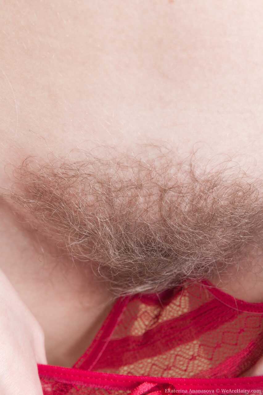 Nerdy Russian with tiny tits Ekaterina Ananasova exposes her hairy bush and pussy for the first time on camera - Ekaterina...