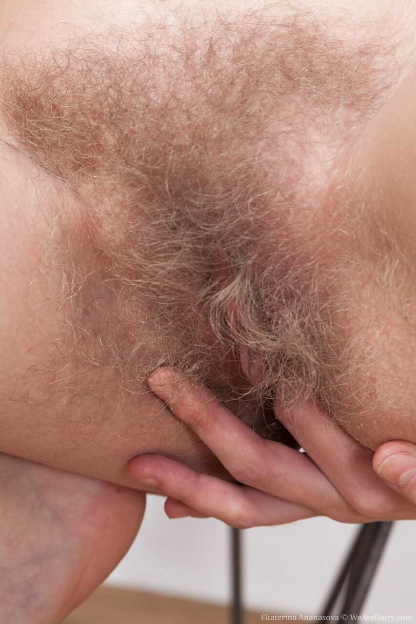 Nerdy Russian with tiny tits Ekaterina Ananasova exposes her hairy bush and pussy for the first time on camera - Ekaterina...