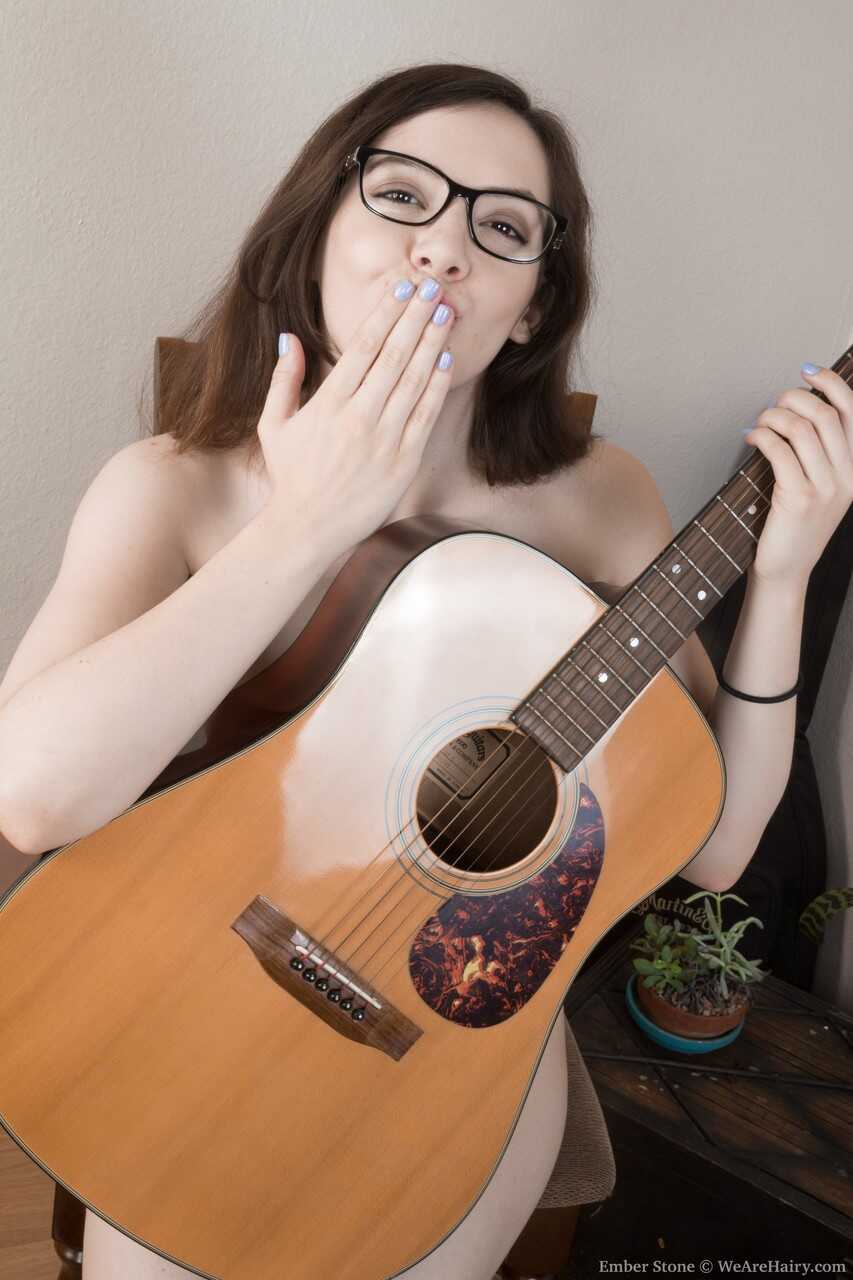 Naughty hairy guitar goddess Ember Stone gets up close and personal with her fuzzy cunt. - Ember Stone