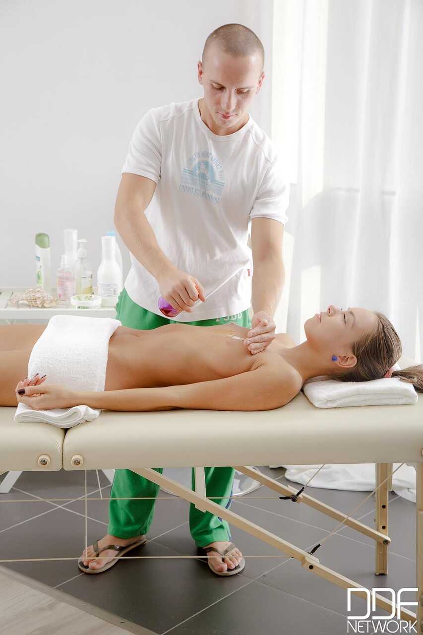 Brunette teen Carre gets a massage before riding a masseur's cock and creamy cum-filled pussy - Carre, Piter