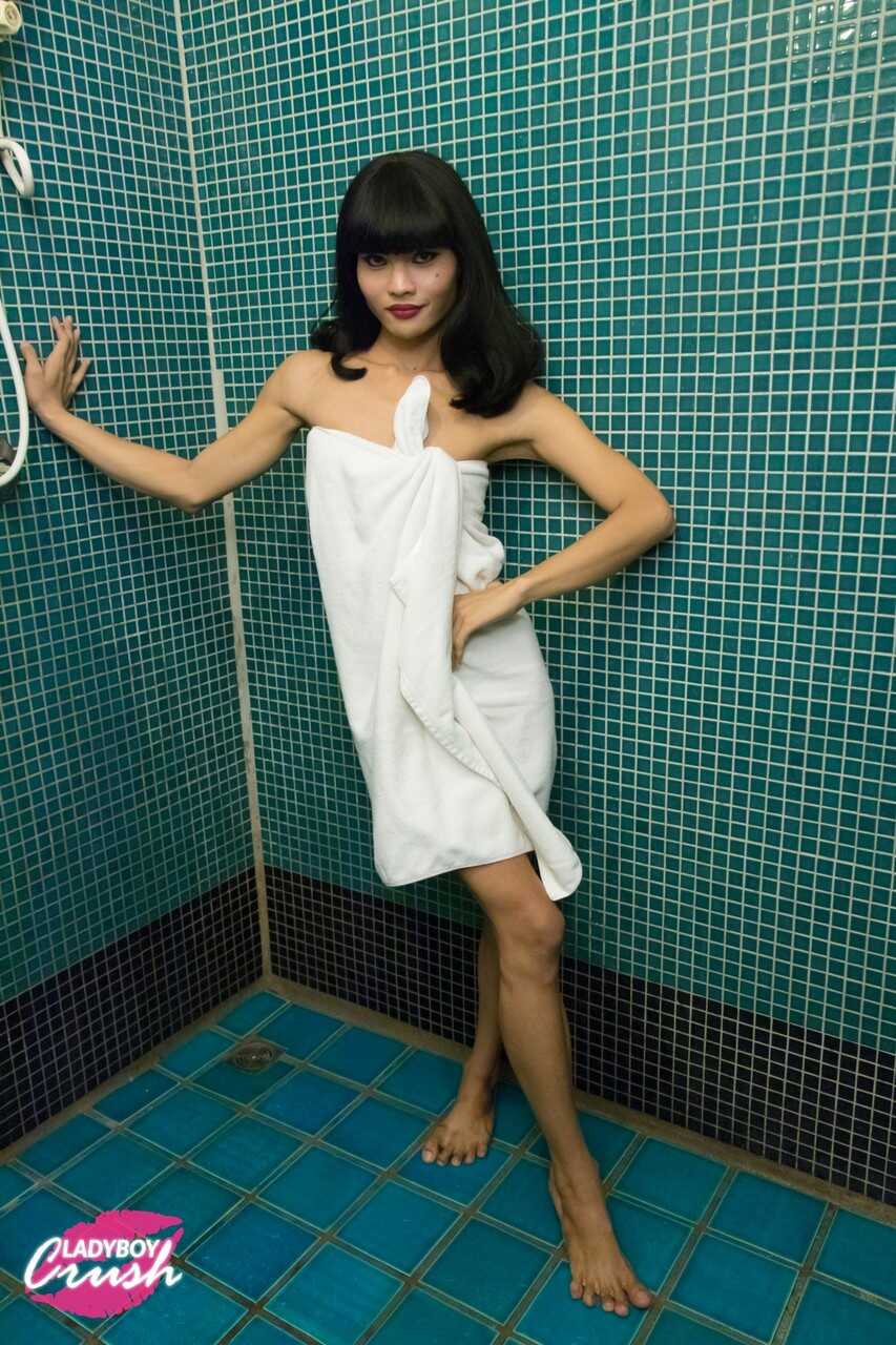 Hairy Asian Shemale Ning Fucks her own Ass in the Pattaya Shower Stall - Ning