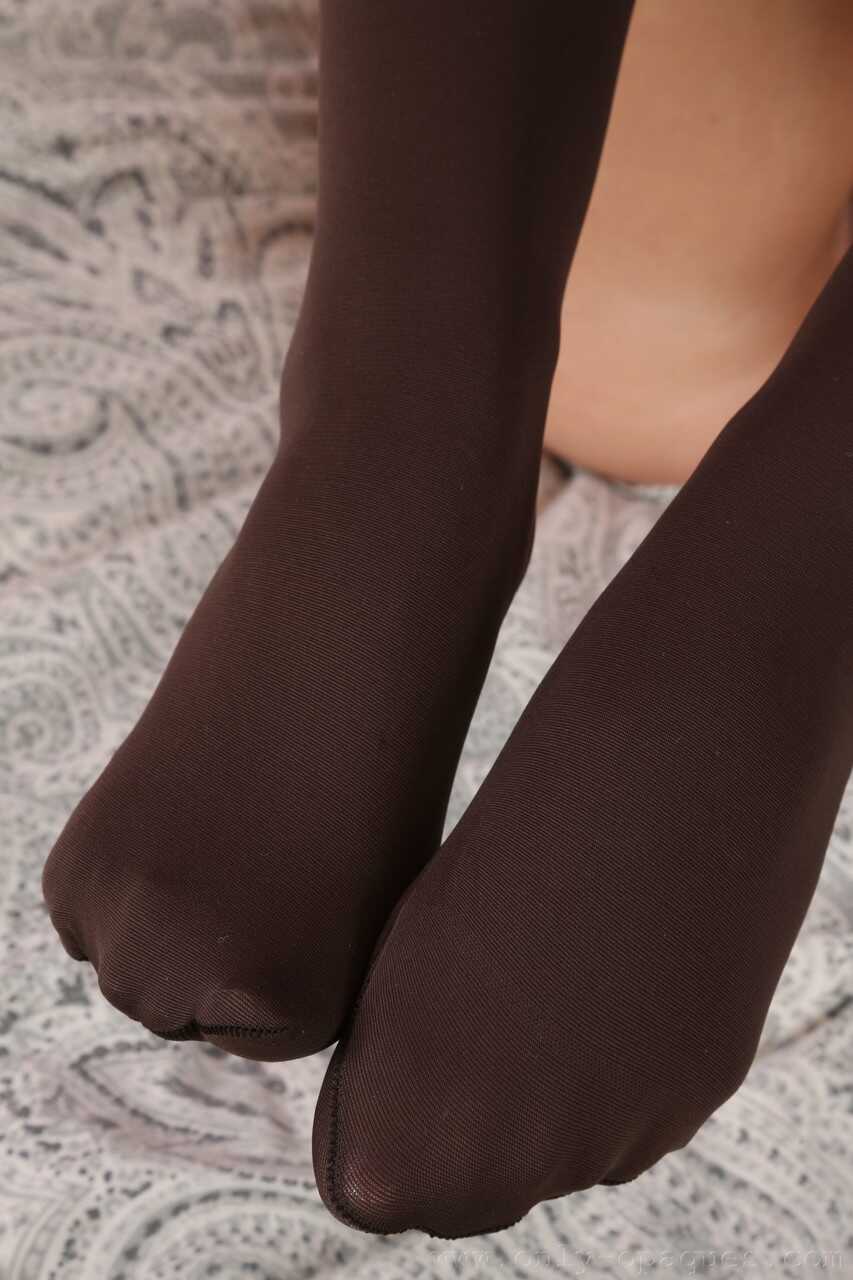 Blonde Lycia poses in stockings and removes her black dress to reveal her cameltoe - Lycia