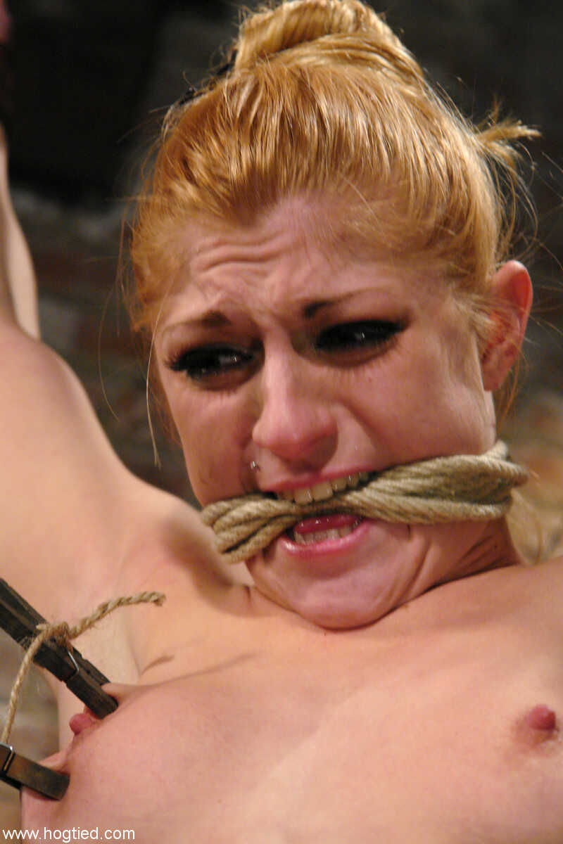 Fiery Redhead Submissive: Tawni Ryden's Intense Dungeon Session - Tawni Ryden