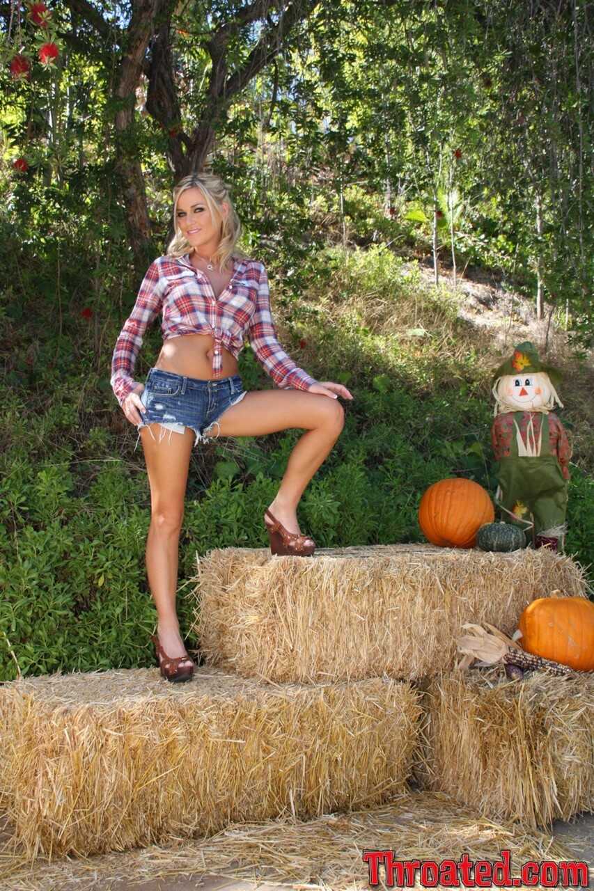 Barely Legal Country Cutie McKenzee Miles Shows Off Her Fake Tits and Ass on Straw Bales in the Barnyard - McKenzee Miles