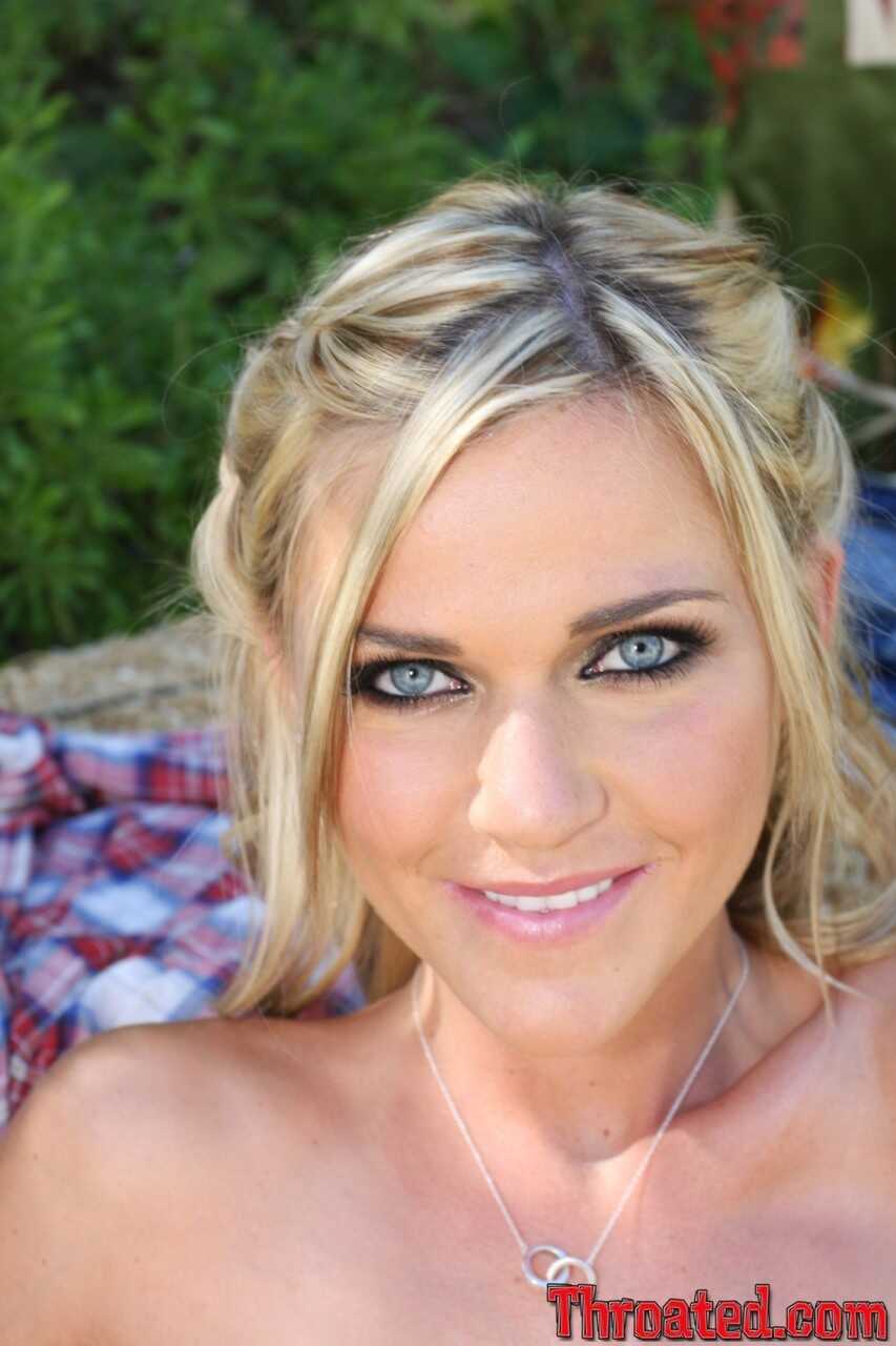 Barely Legal Country Cutie McKenzee Miles Shows Off Her Fake Tits and Ass on Straw Bales in the Barnyard - McKenzee Miles
